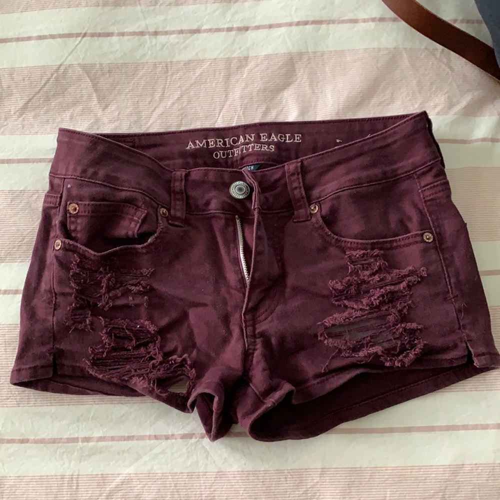Maroon ripped shorts